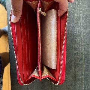 Never used red Michael khors wristlet and wallet.Will sell together or separate.